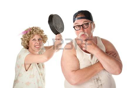 7315882-wife-readies-a-pan-to-her-clueless-husband-s-head.jpg