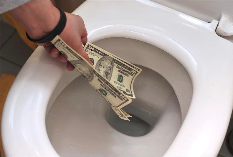 money-down-toilet_69836.jpg