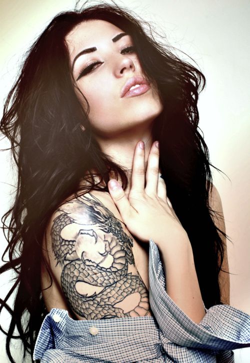 Pretty-girls-snake-tattoo-on-arm-and-shoulder.jpg