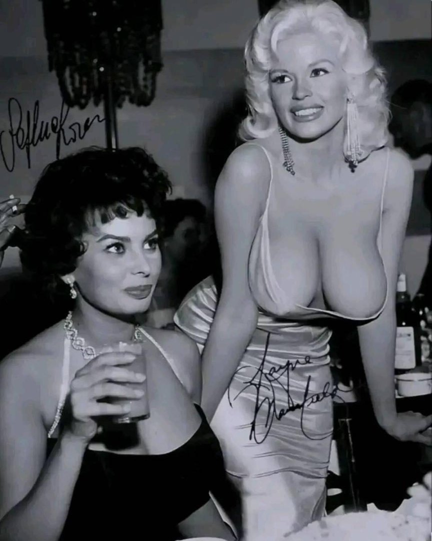 1957, Sophia Loren and Jayne Mansfield - California, a dinner in Beverly Hills at the exclusiv...jpg